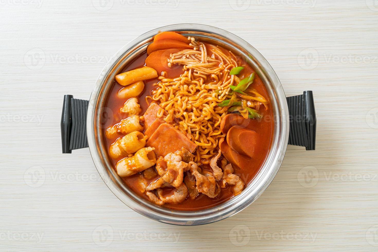 Budae Jjigae or Budaejjigae or Army stew or Army base stew. It is loaded with Kimchi, spam, sausages, ramen noodles and much more photo