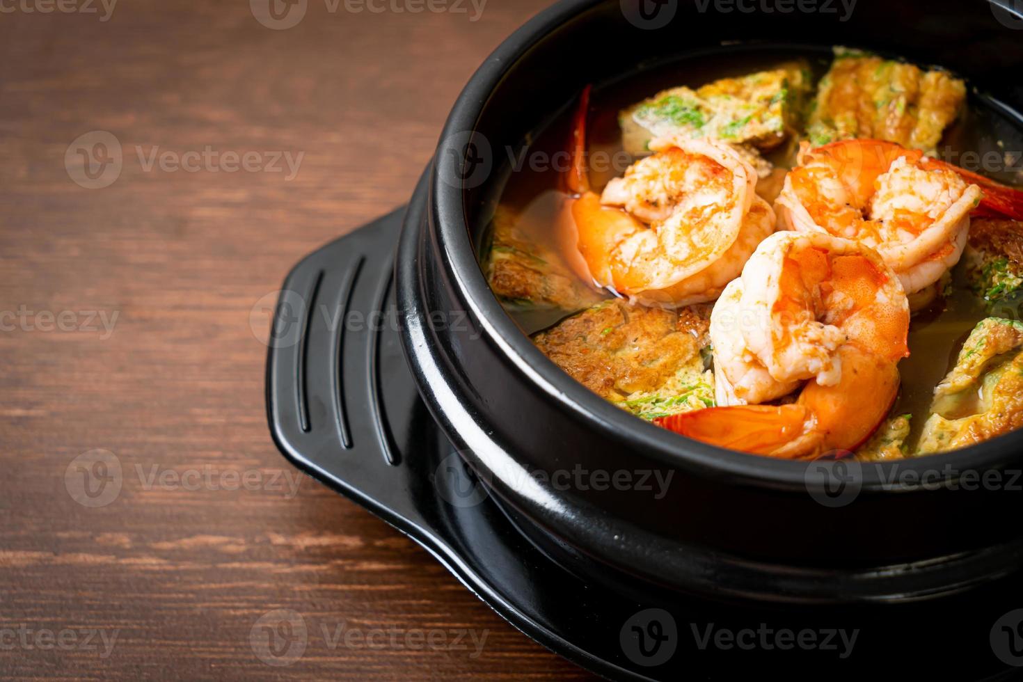 Sour soup made of Tamarind Paste with Shrimps and Vegetable Omelet photo