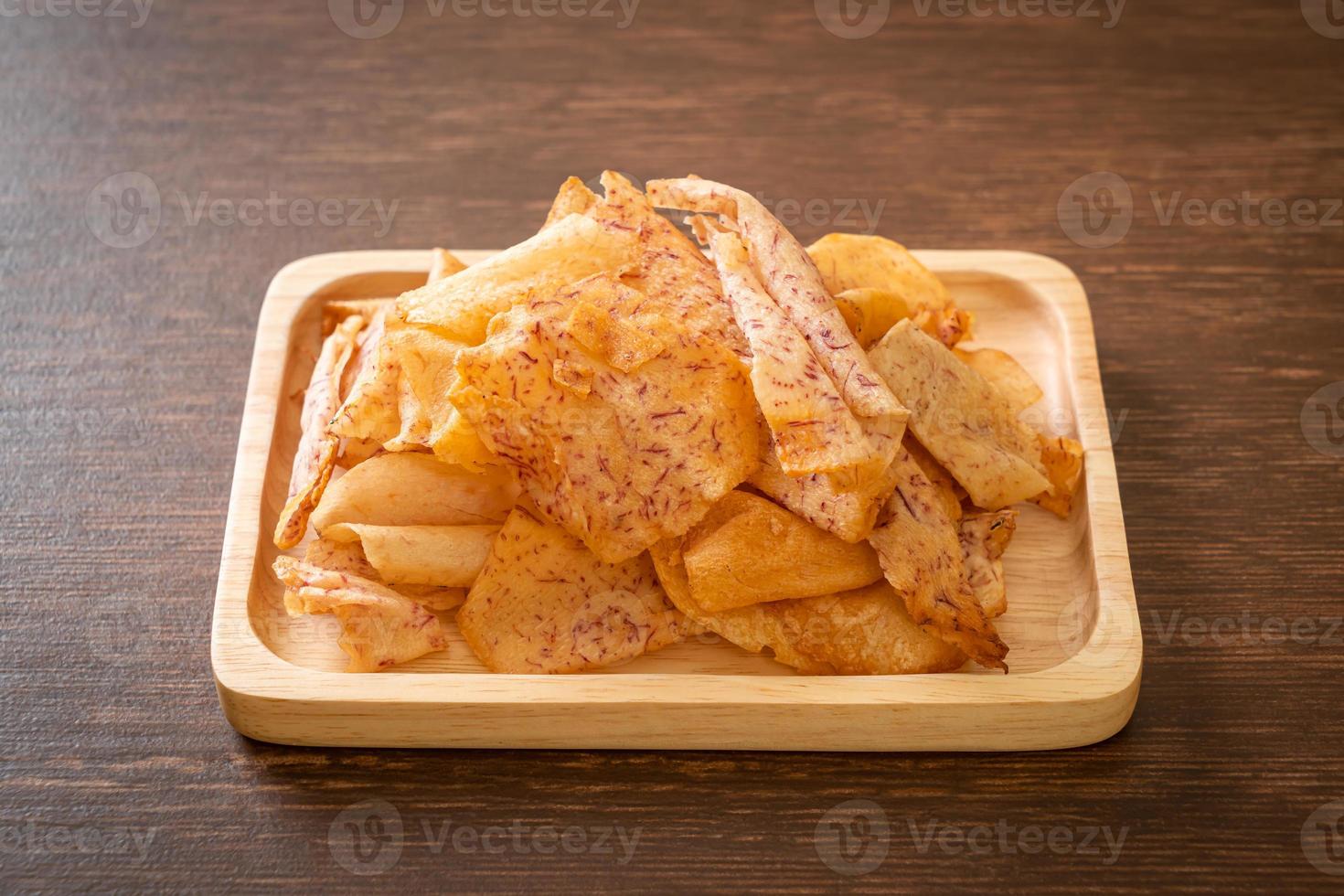 Taro Chips - fried or baked sliced taro photo