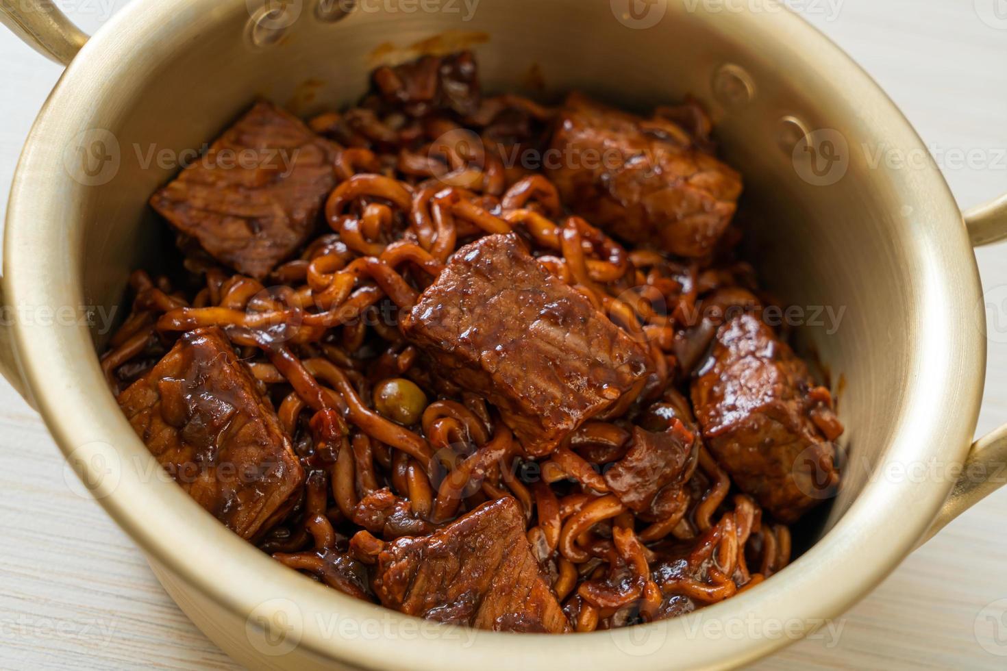 Jjapaguri or Chapaguri, Korean Black Beans Spicy Noodles with Beef photo