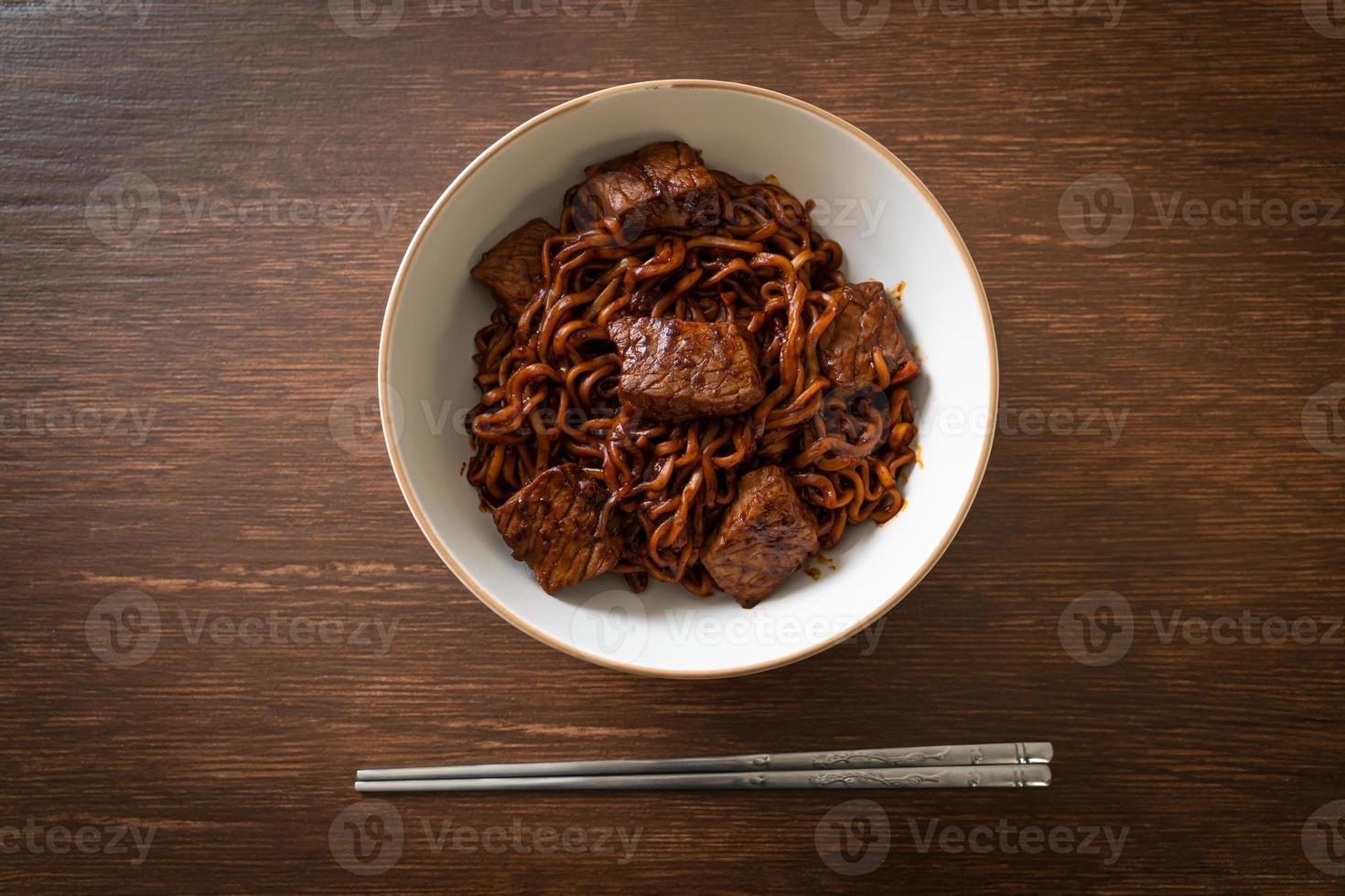 Jjapaguri or Chapaguri, Korean Black Beans Spicy Noodles with Beef photo