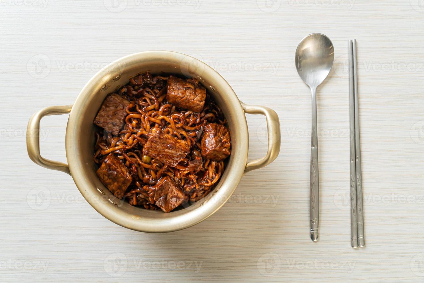 Jjapaguri or Chapaguri, Korean Black Beans Spicy Noodles with Beef photo