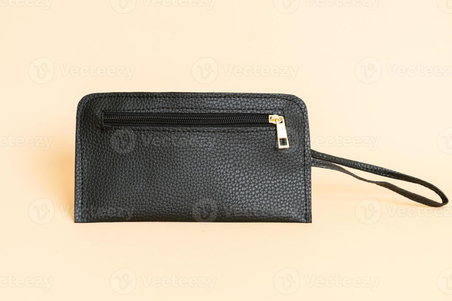 Black leather handbag and black leather card bag photo