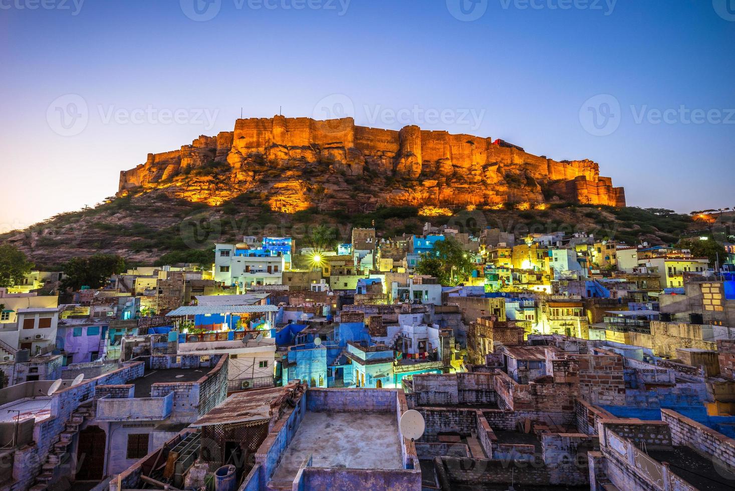 Night view of Jodhpur and Mehrangarh Fort in India photo