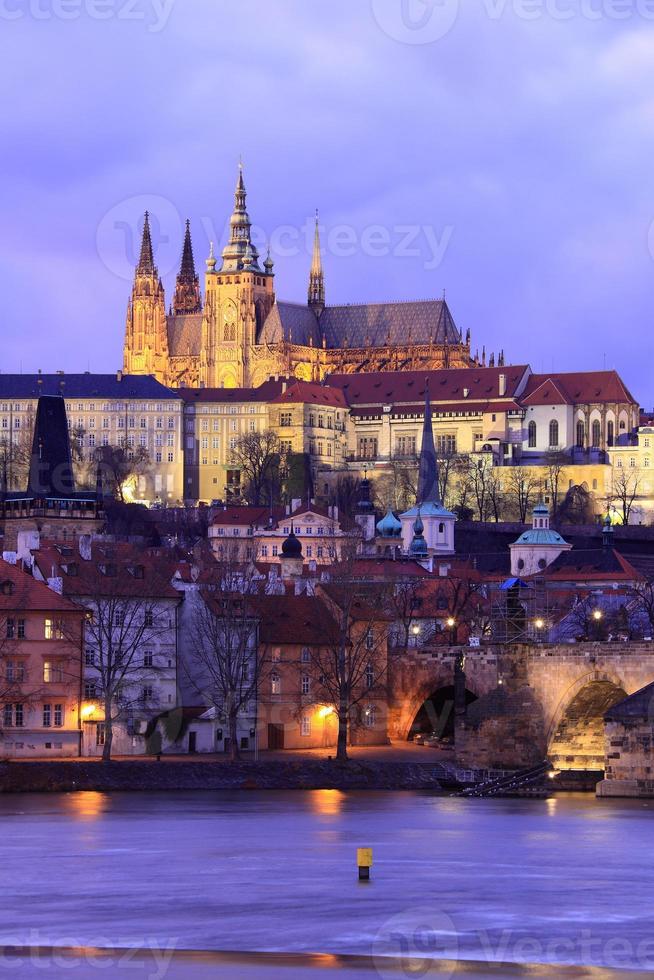 View of Prague with the gothic Castle and Charles Bridge photo