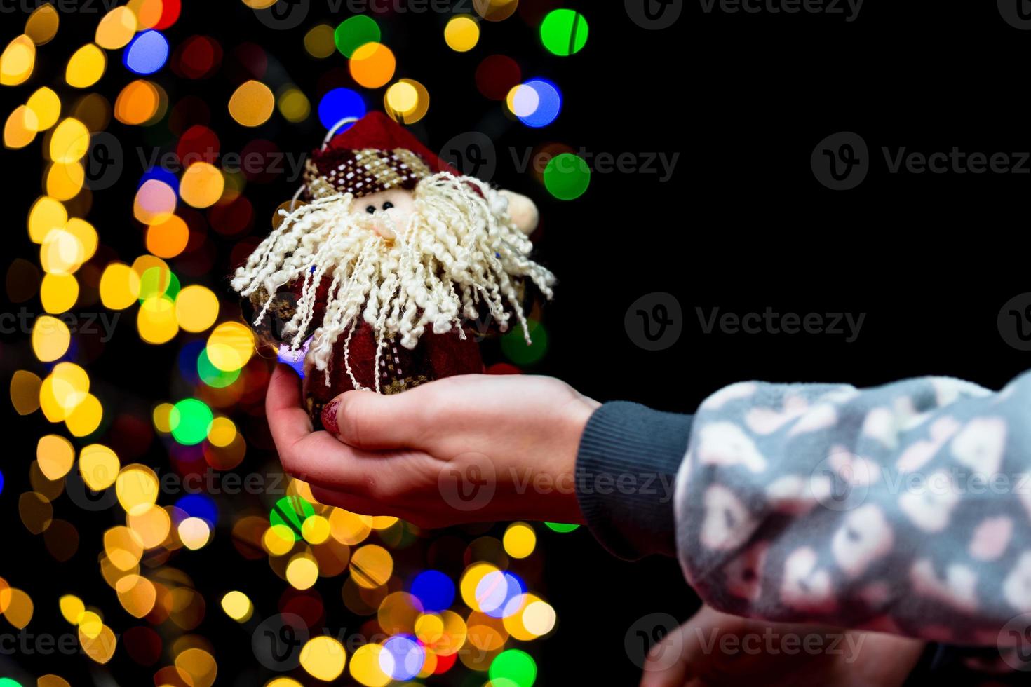 Woman holding Christmas decoration photo