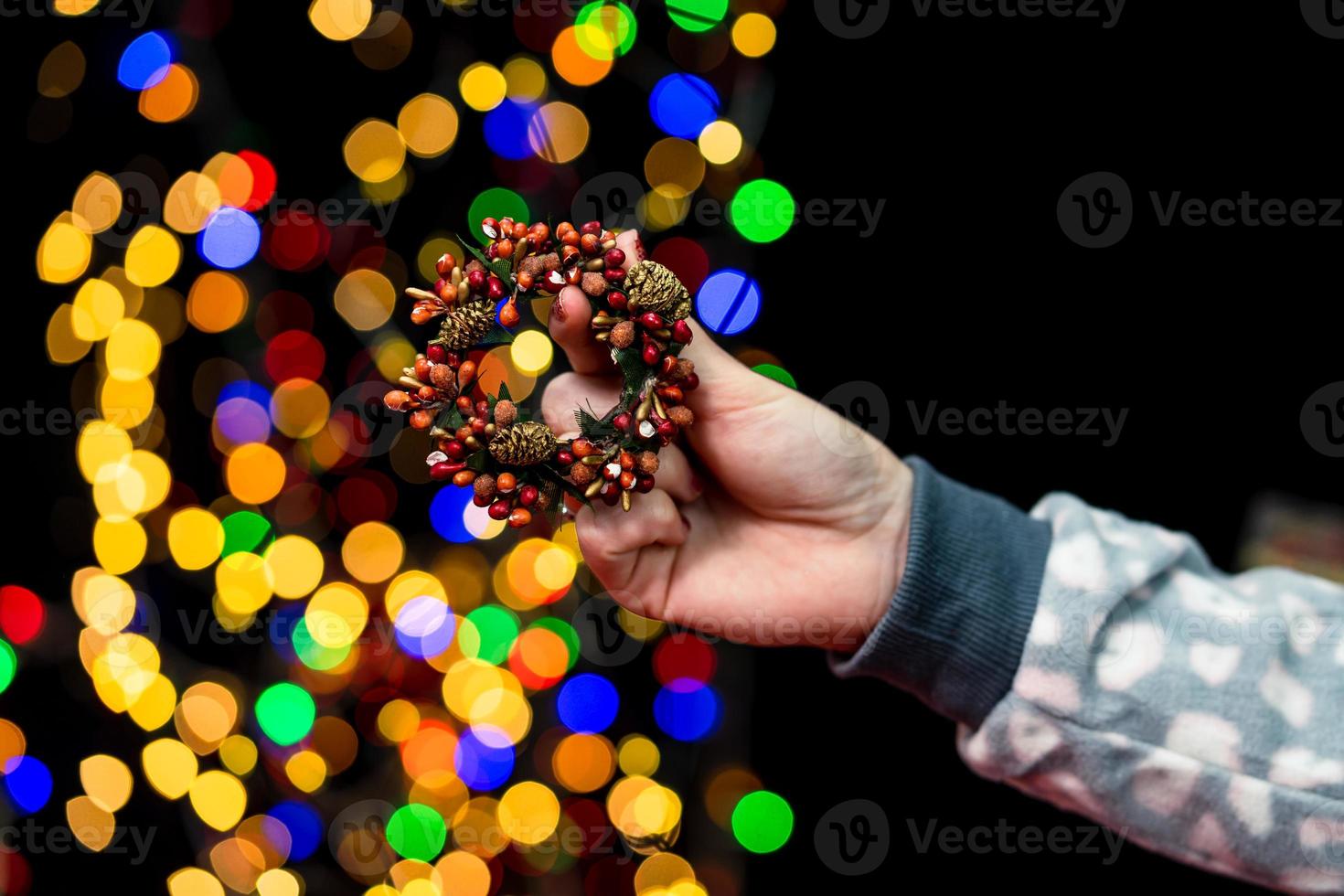 Woman holding Christmas decoration photo