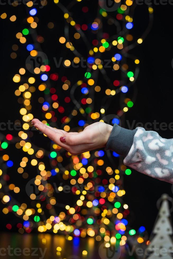 Woman holding Christmas decoration photo