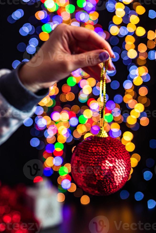 Hand holding Christmas bauble photo