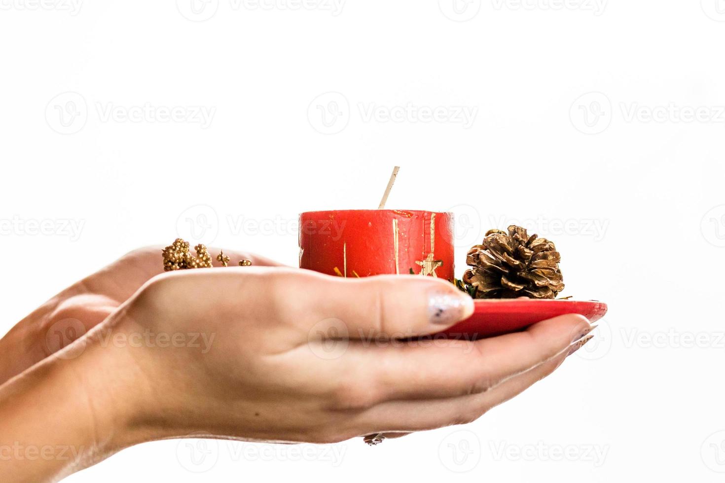 Hand holding Christmas decoration photo