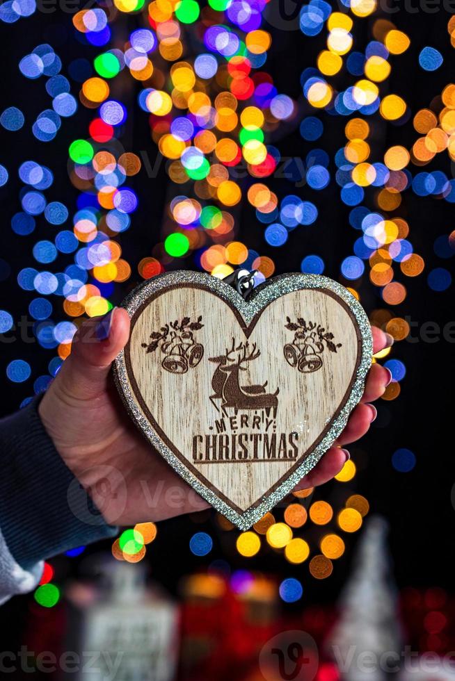 Hand holding Christmas decoration photo