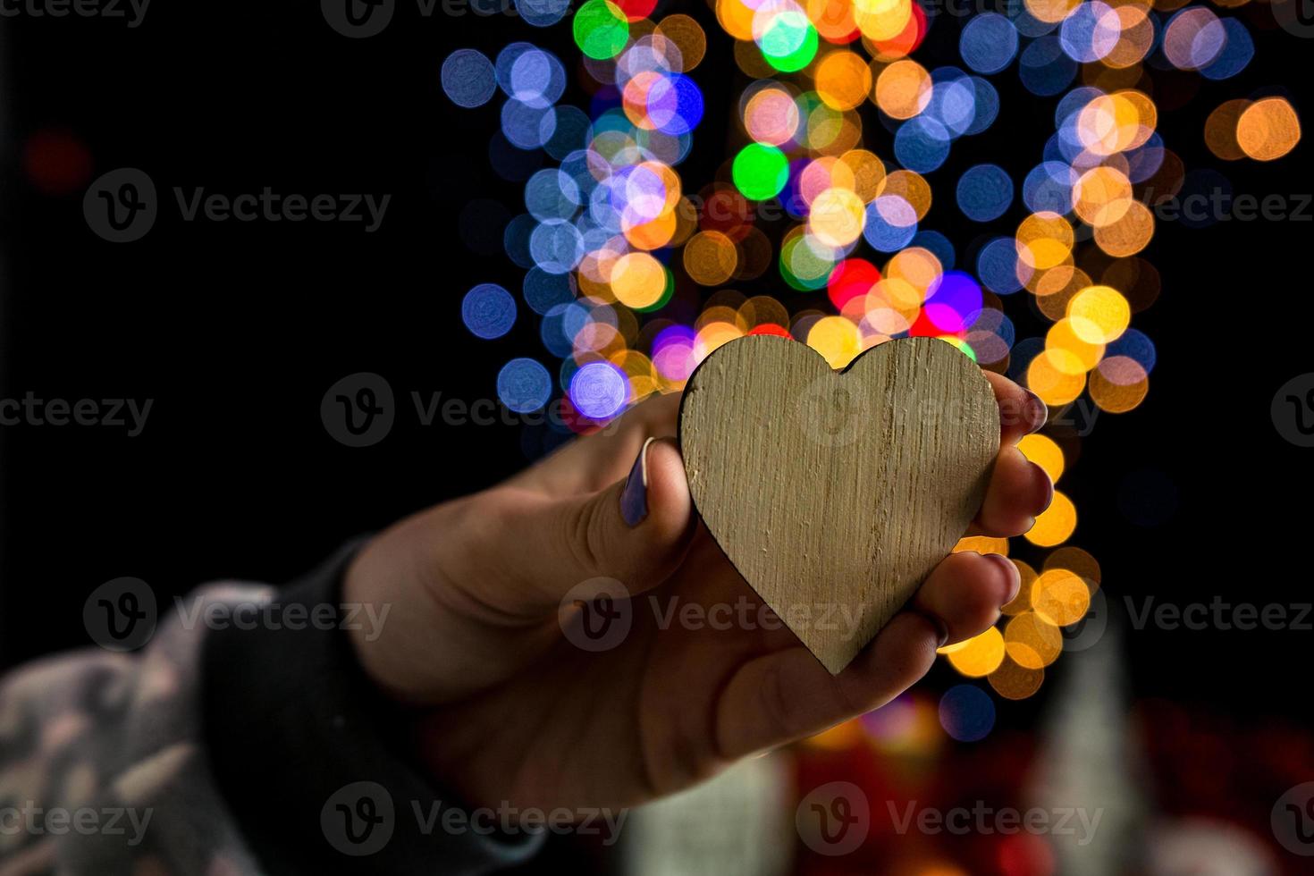 Hand holding Christmas decoration photo