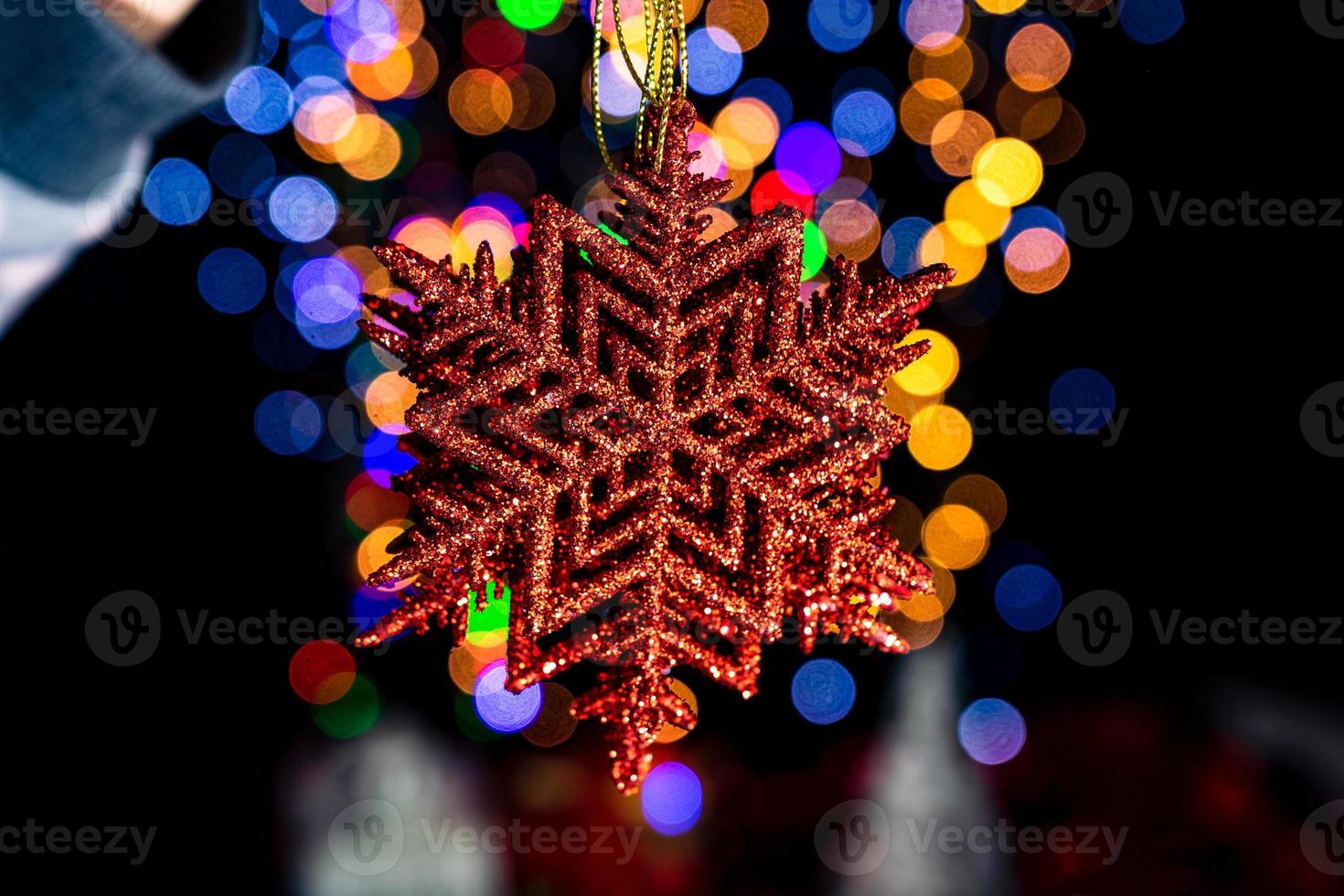 Hand holding Christmas decoration photo