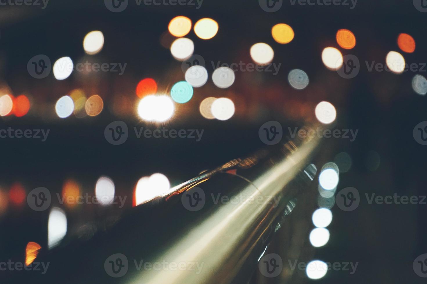 Christmas bokeh lights at night on the street photo