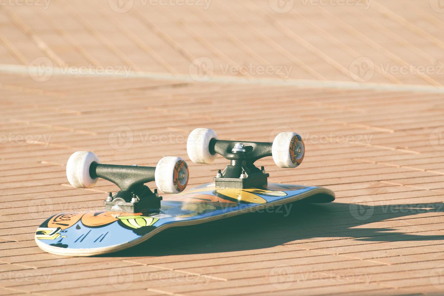 Single skateboard upside down photo