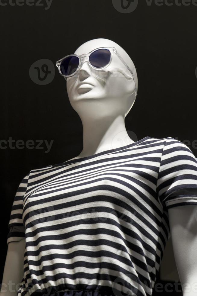 Elegant dummy of a clothing store photo