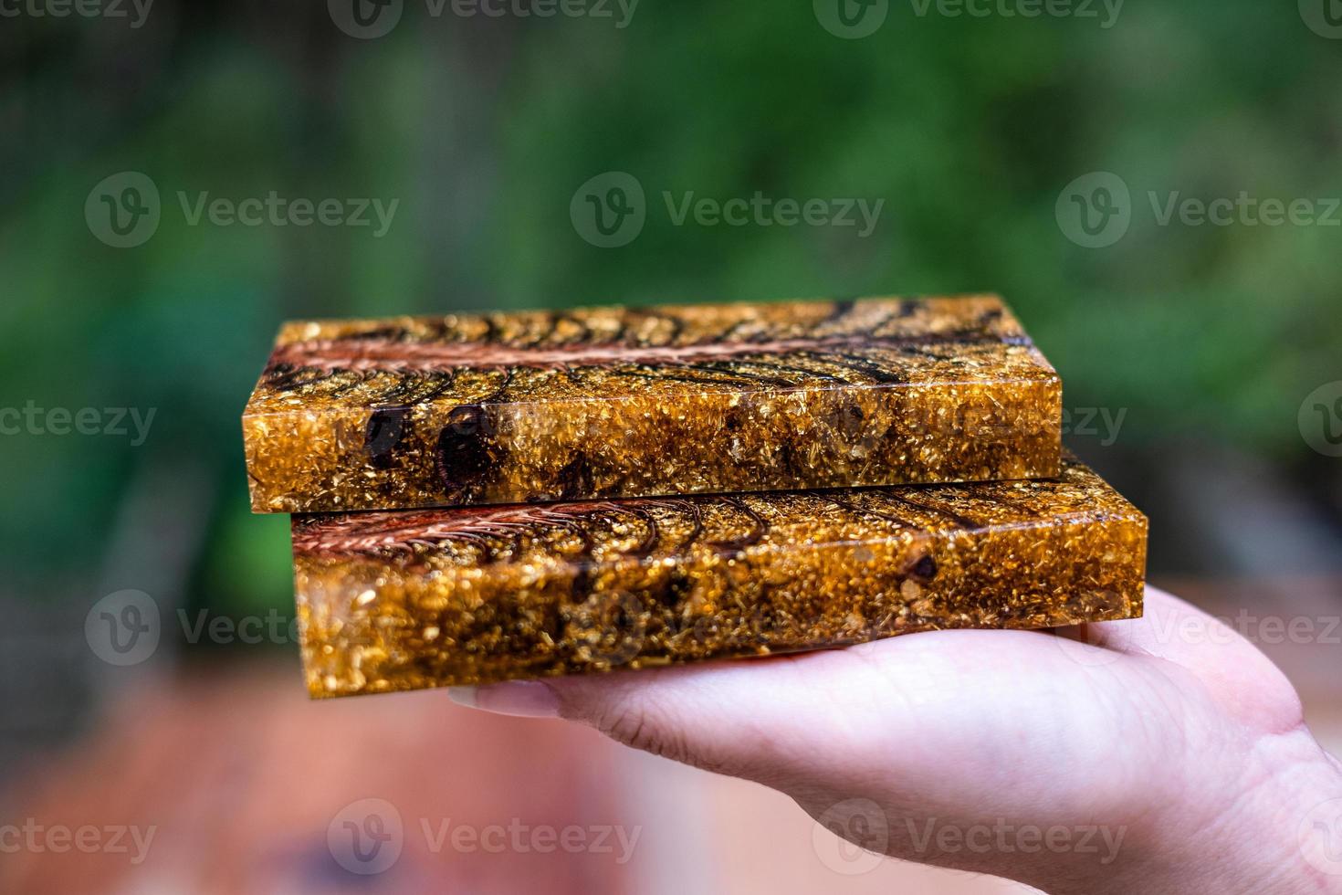 Casting epoxy resin stabilizing pine cone photo