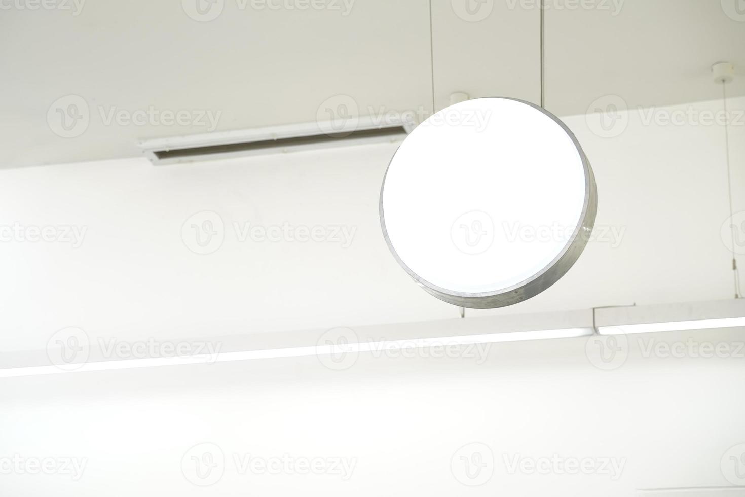 Blank circle light box in cafe. photo