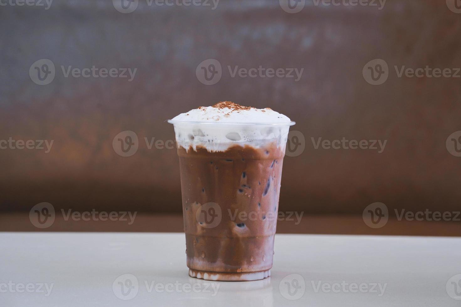 Iced chocolate cocoa on the table in the cafe. photo