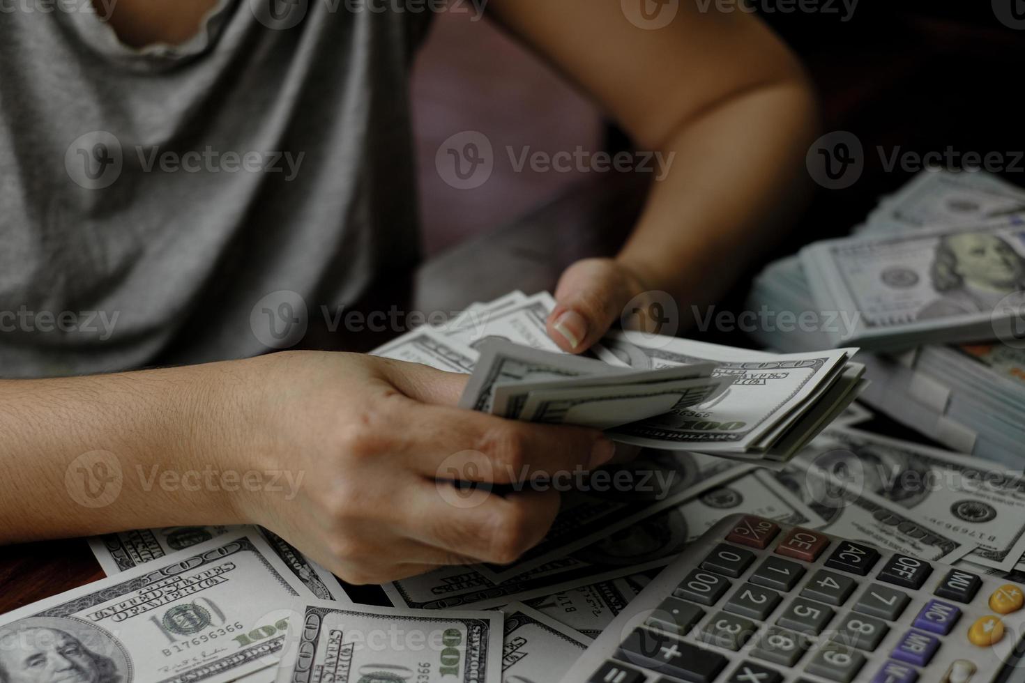 Woman holding money photo