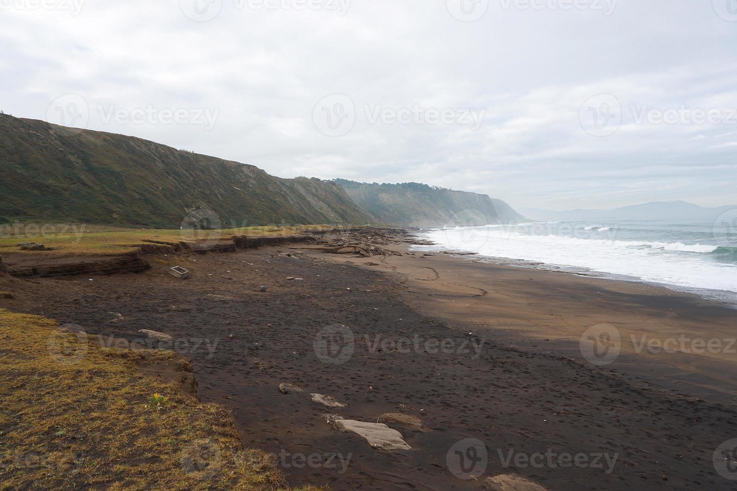 Beach landscape in the coast in Bilbao Spain photo