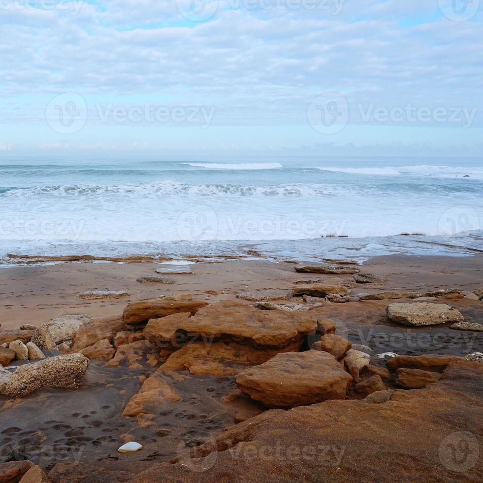 Beach landscape in the coast in Bilbao Spain photo