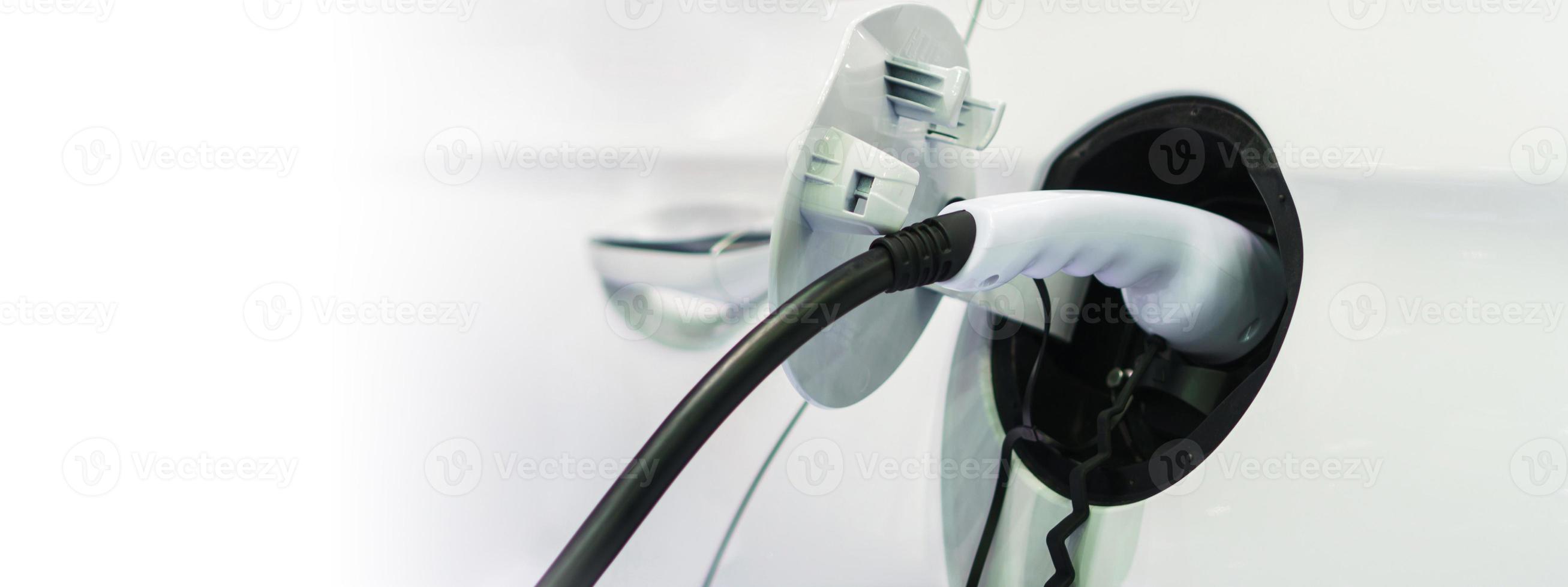 Electric car charging on charge station, Transport which are the future of the automobile photo