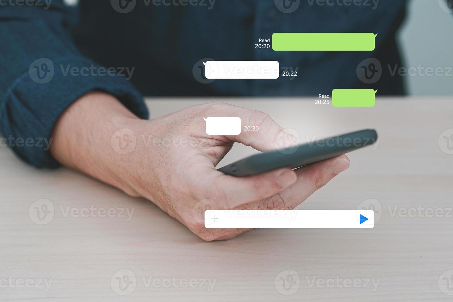 Man using instant messaging app on mobile phone. Mobile chat online. photo