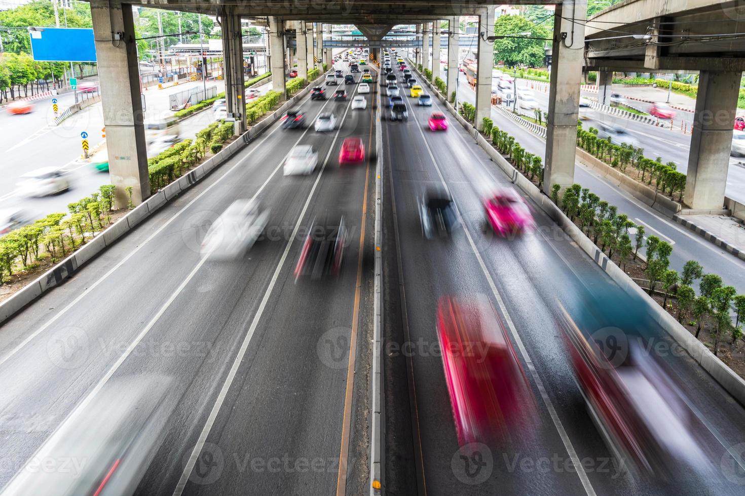Motion blur of car on the road in the city photo