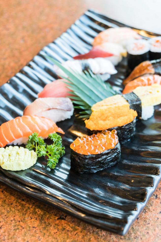 Sushi in black plate photo