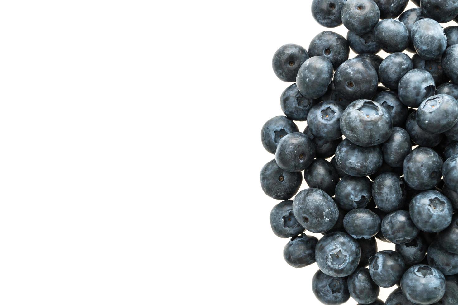 Blueberry fruit on white photo
