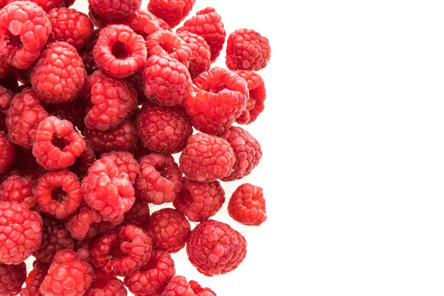 Rasberry fruit on white photo