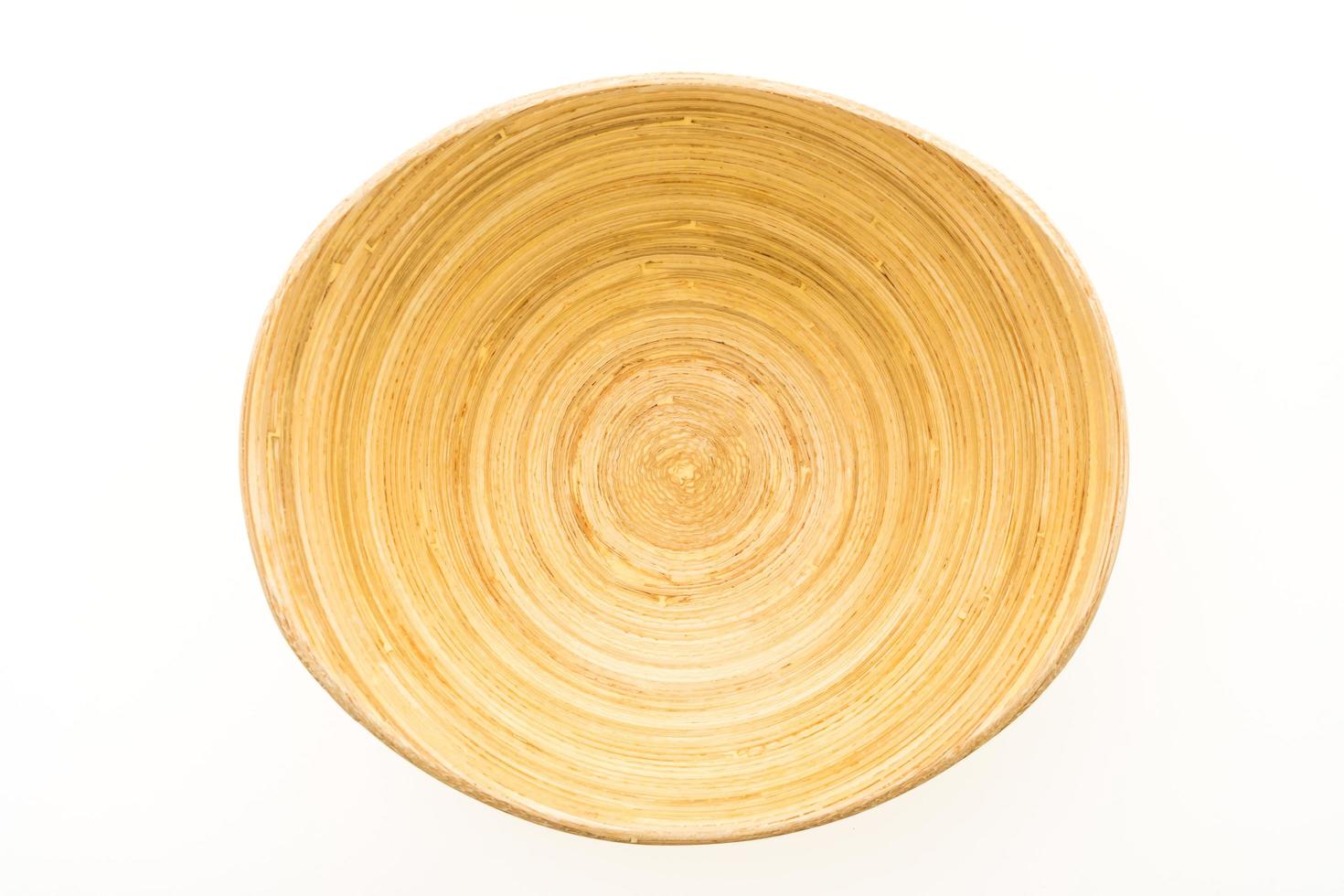 Wooden bowl on white photo