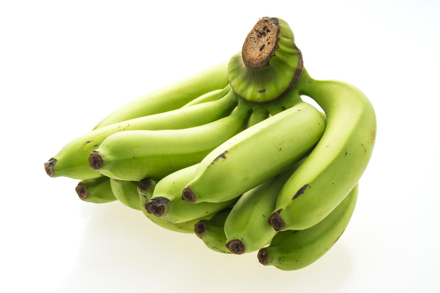 Green banana on white photo