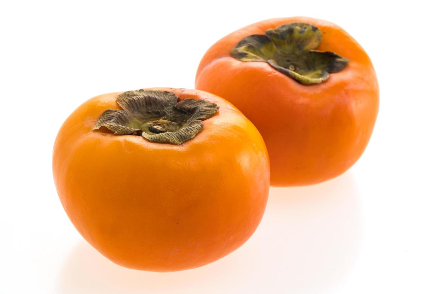 persimmon fruit on white photo