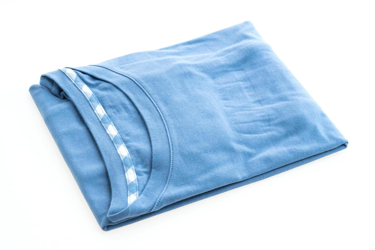 Blue t-shirt on white photo