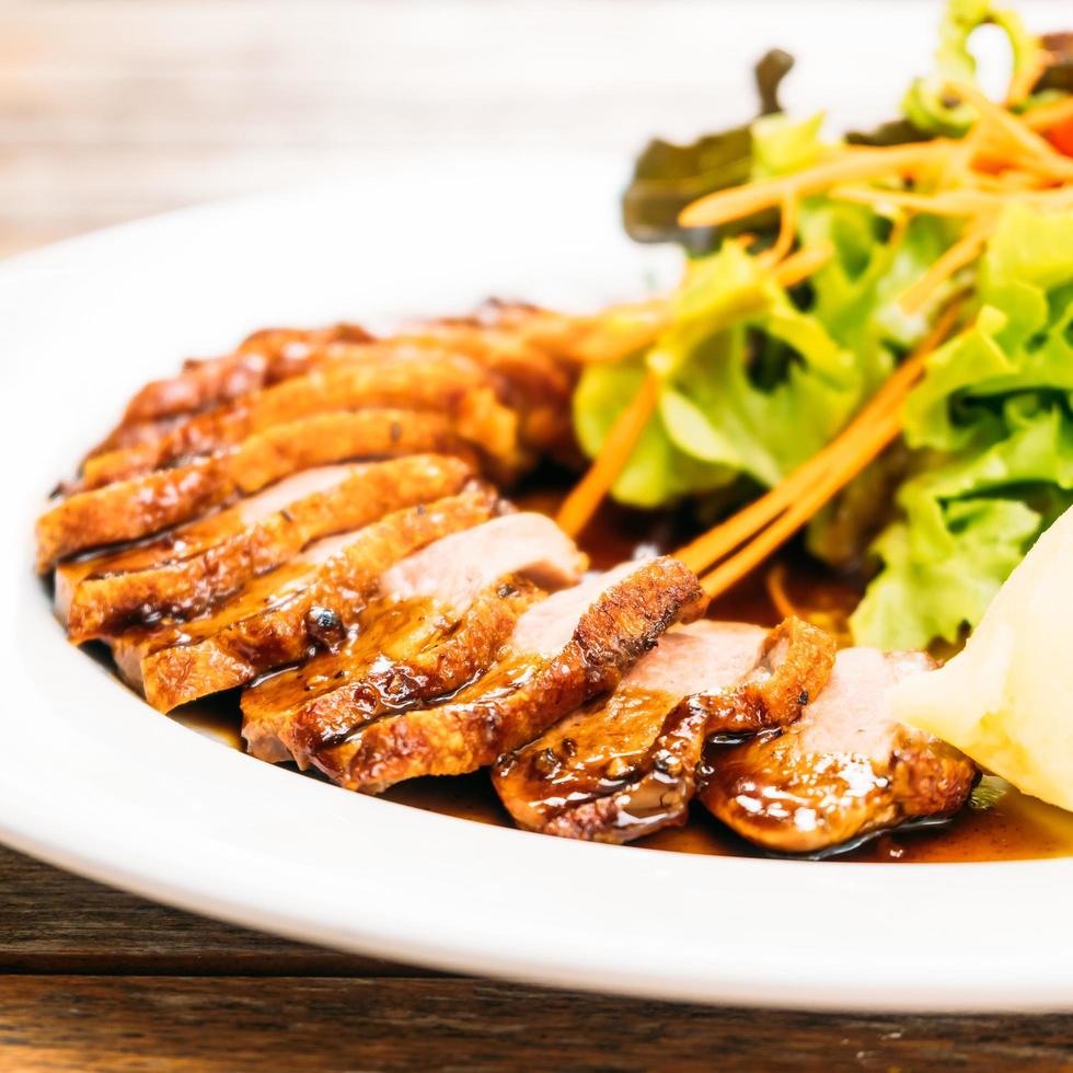 Grilled duck meat breast with vegetable photo