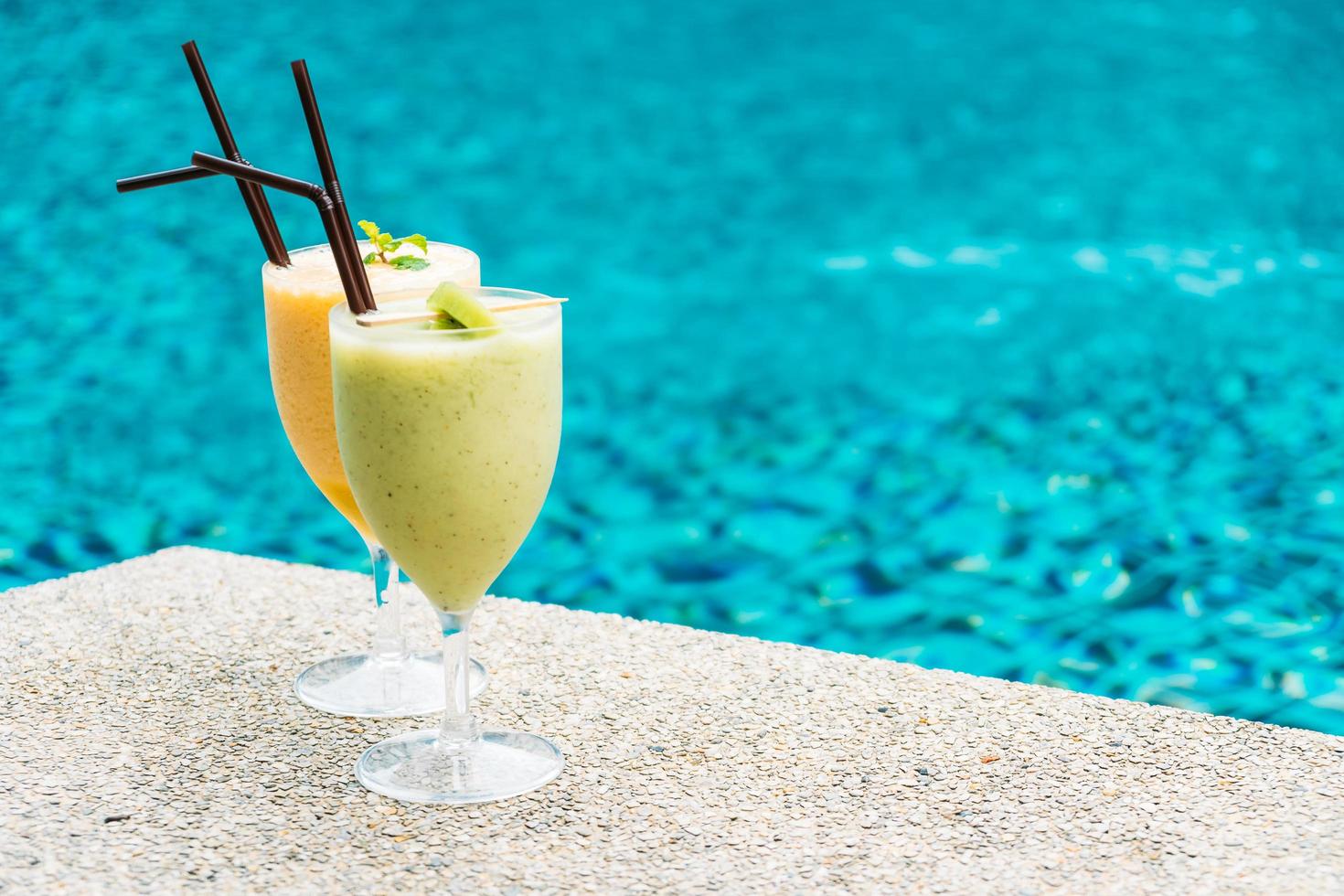 Smoothies with pool background photo