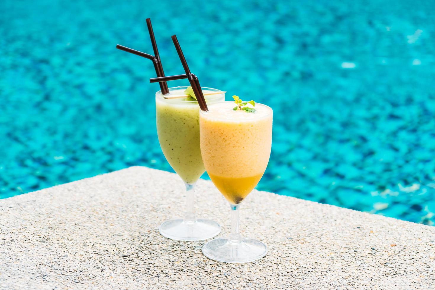 Smoothies with pool background photo