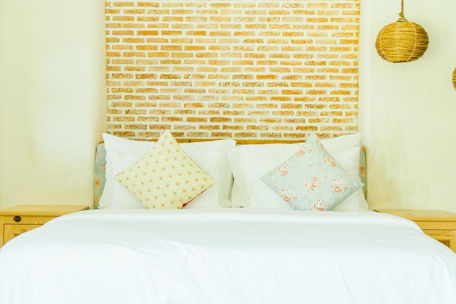 Pillow on bed decoration in bedroom interior photo