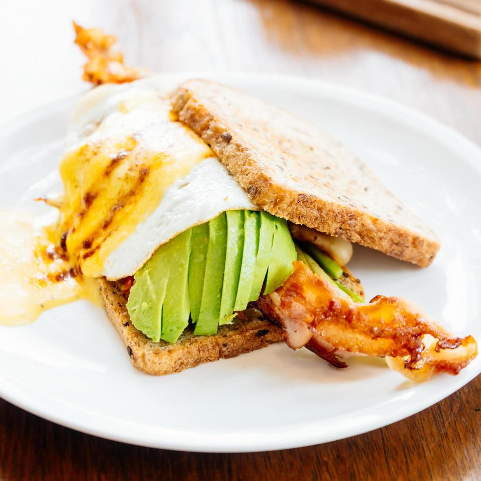 Sandwich with avocado bacon and asparagus photo