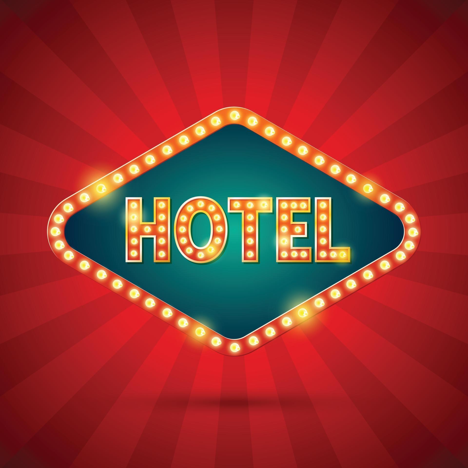 Hotel, neon sign light frame. text with electric bulbs on red