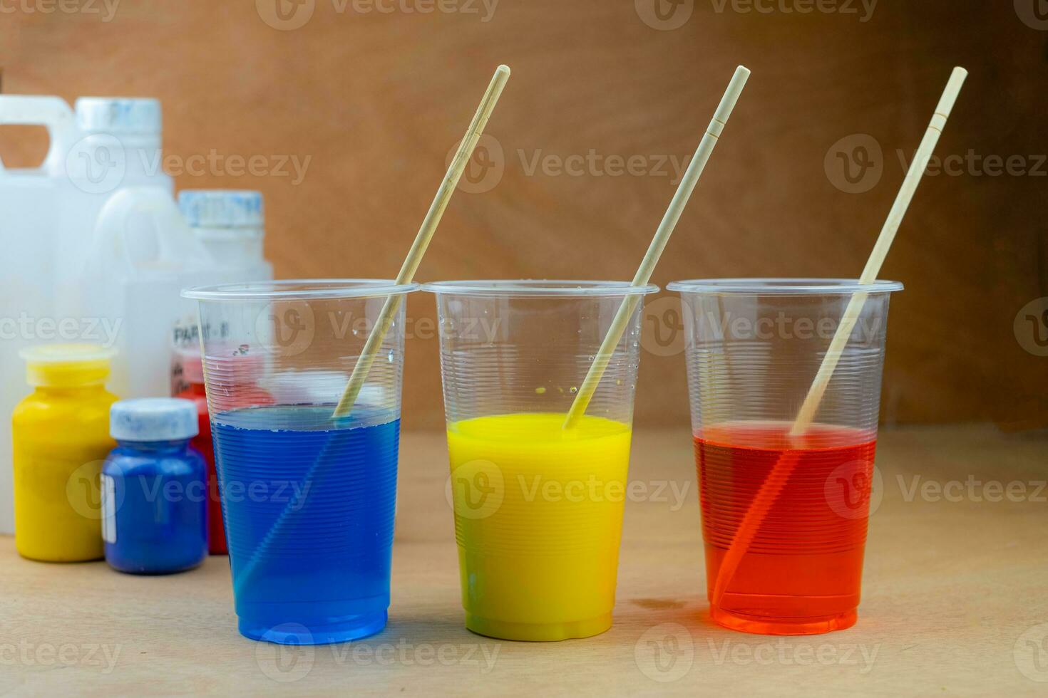 Mixing color epoxy resin in plastic cup photo