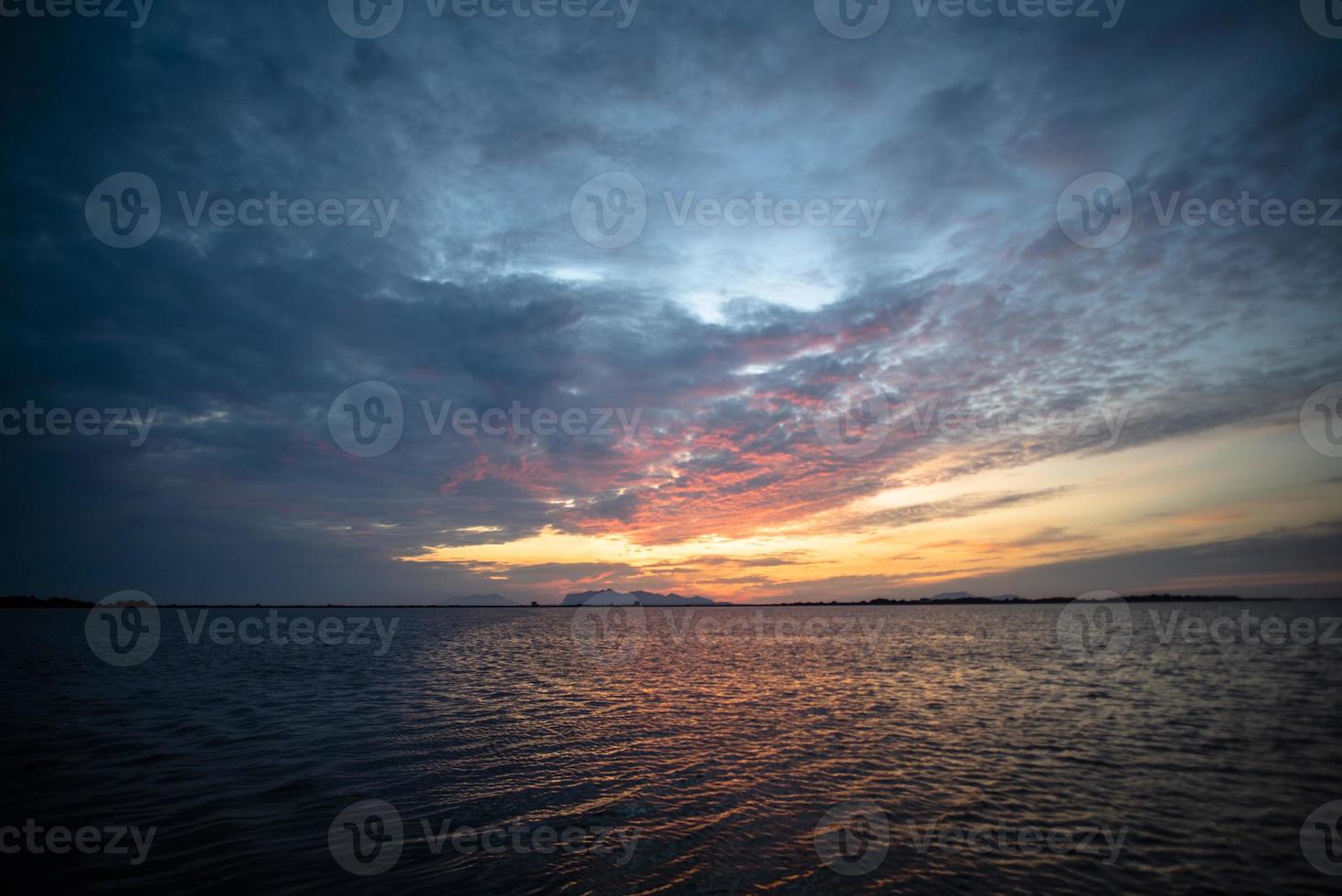 Sunset over the Stagnone lagoon at Marsala, Sicily, Italy photo