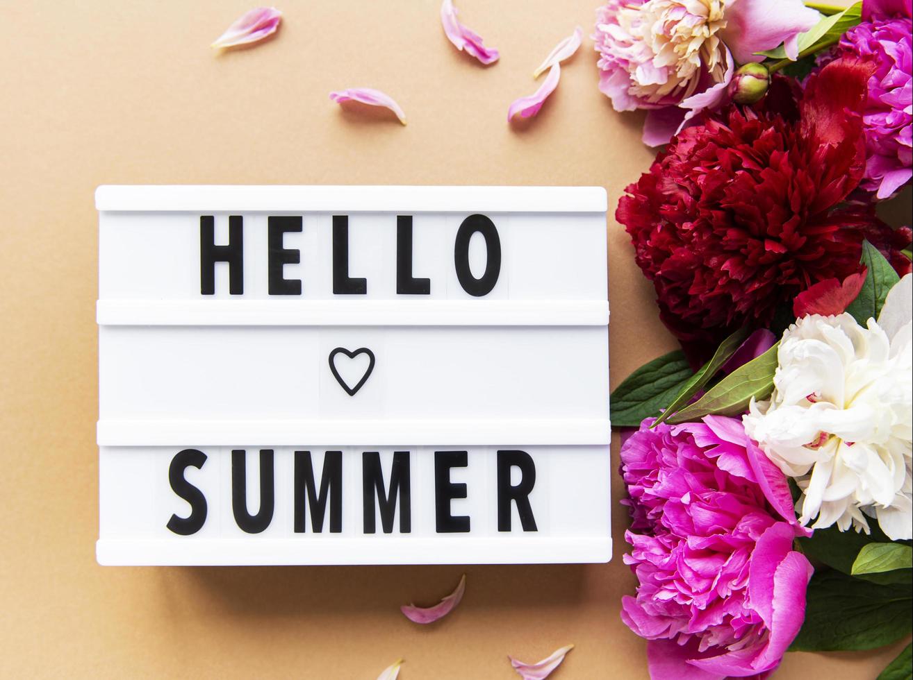 Light box with Hello Summer text and peonies photo