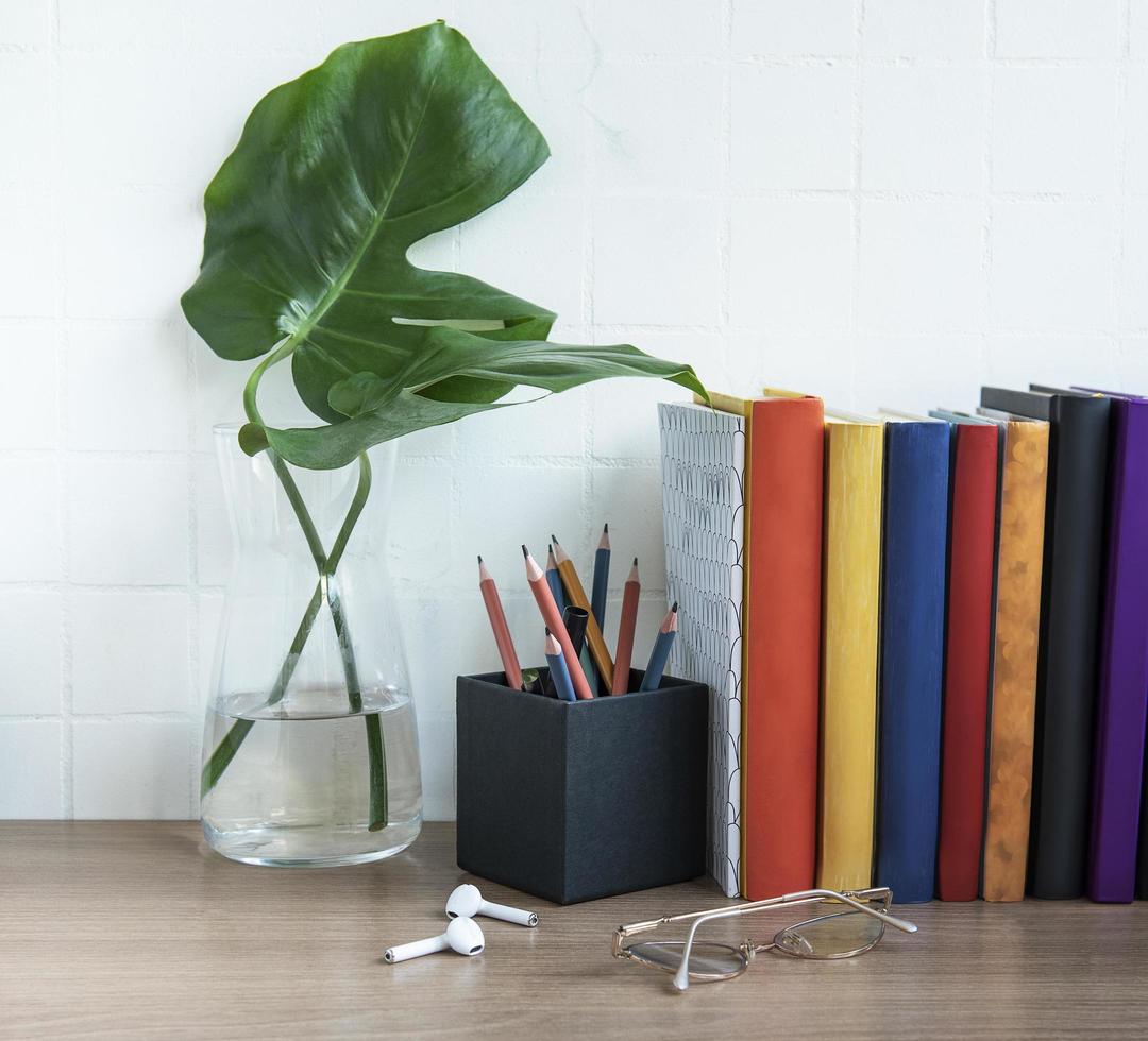 Stack of books on the desktop photo