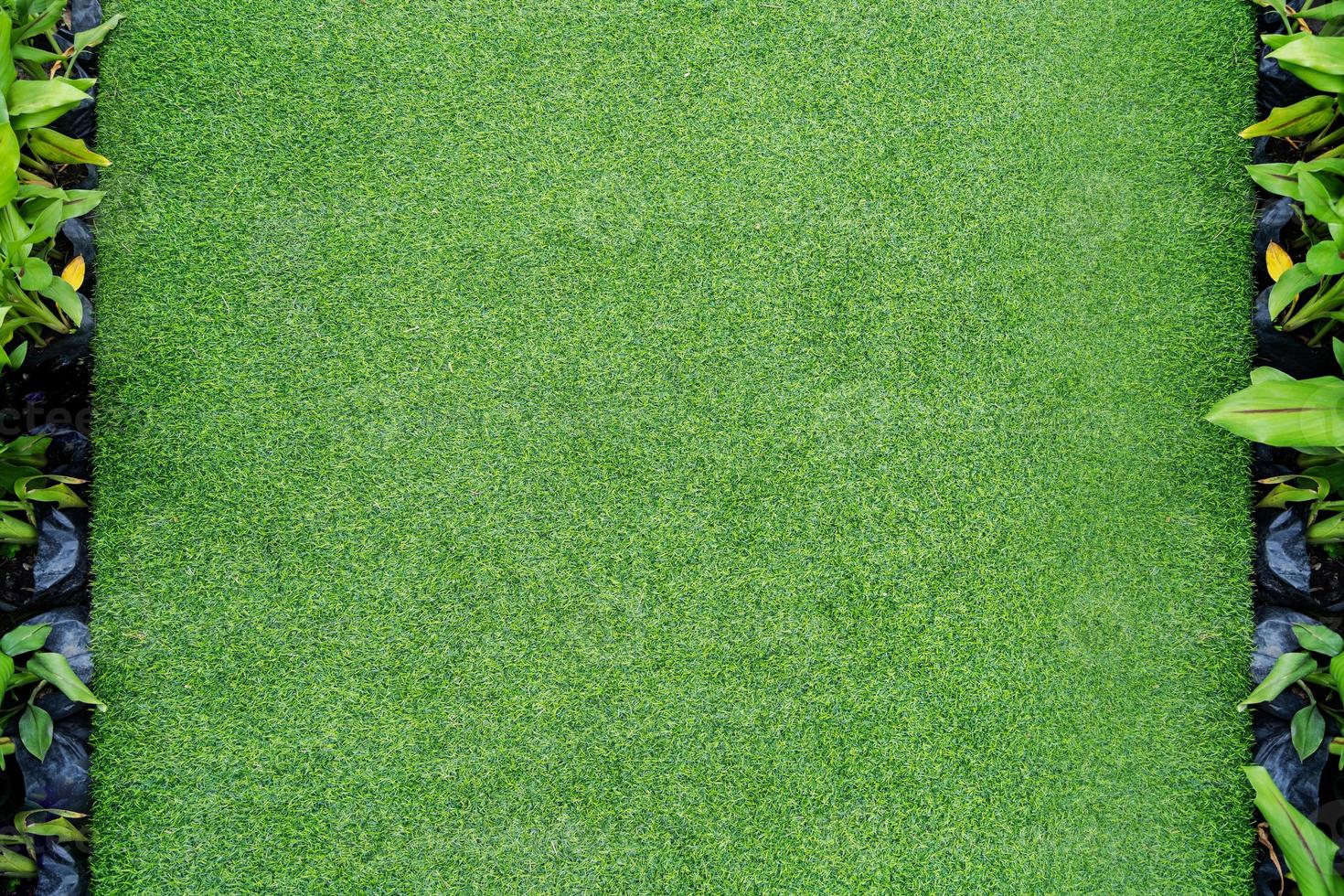 Top view photo, Artificial green grass texture background photo