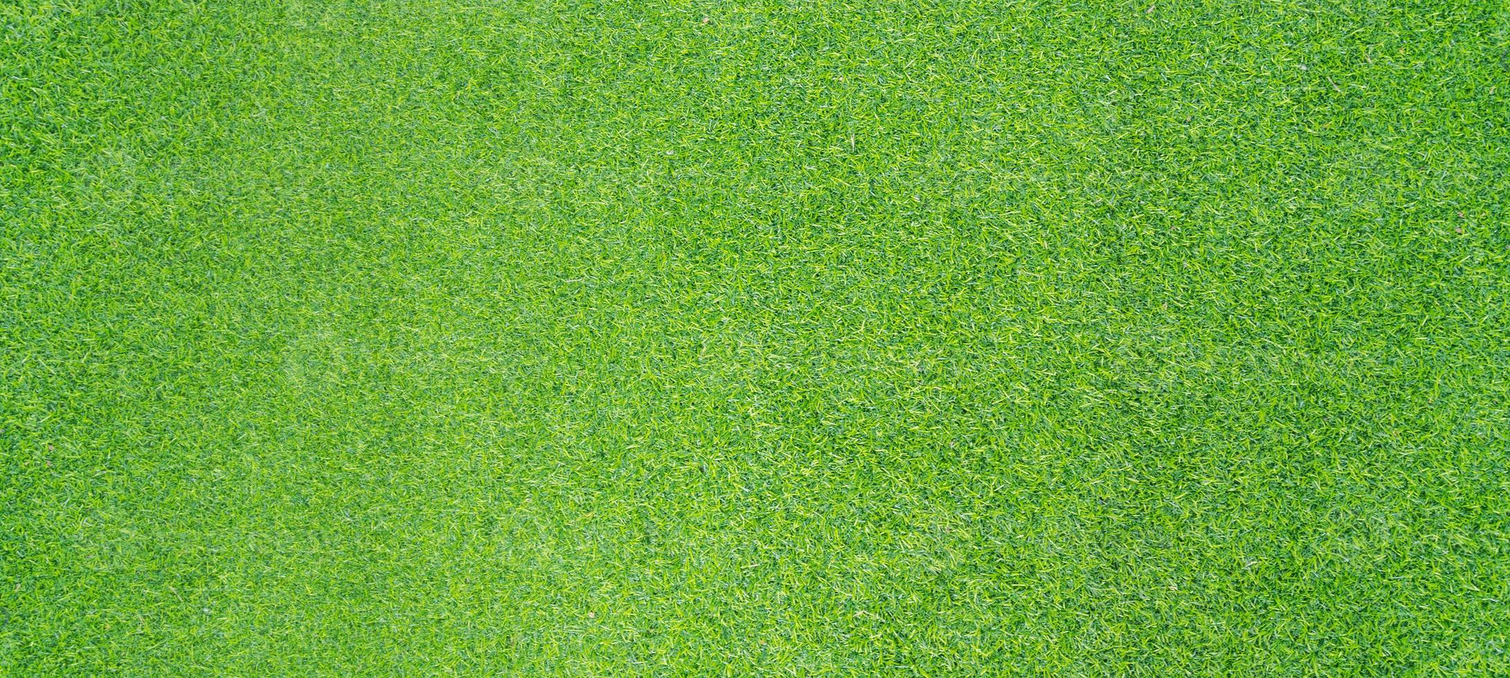 Top view photo, Artificial green grass texture background photo