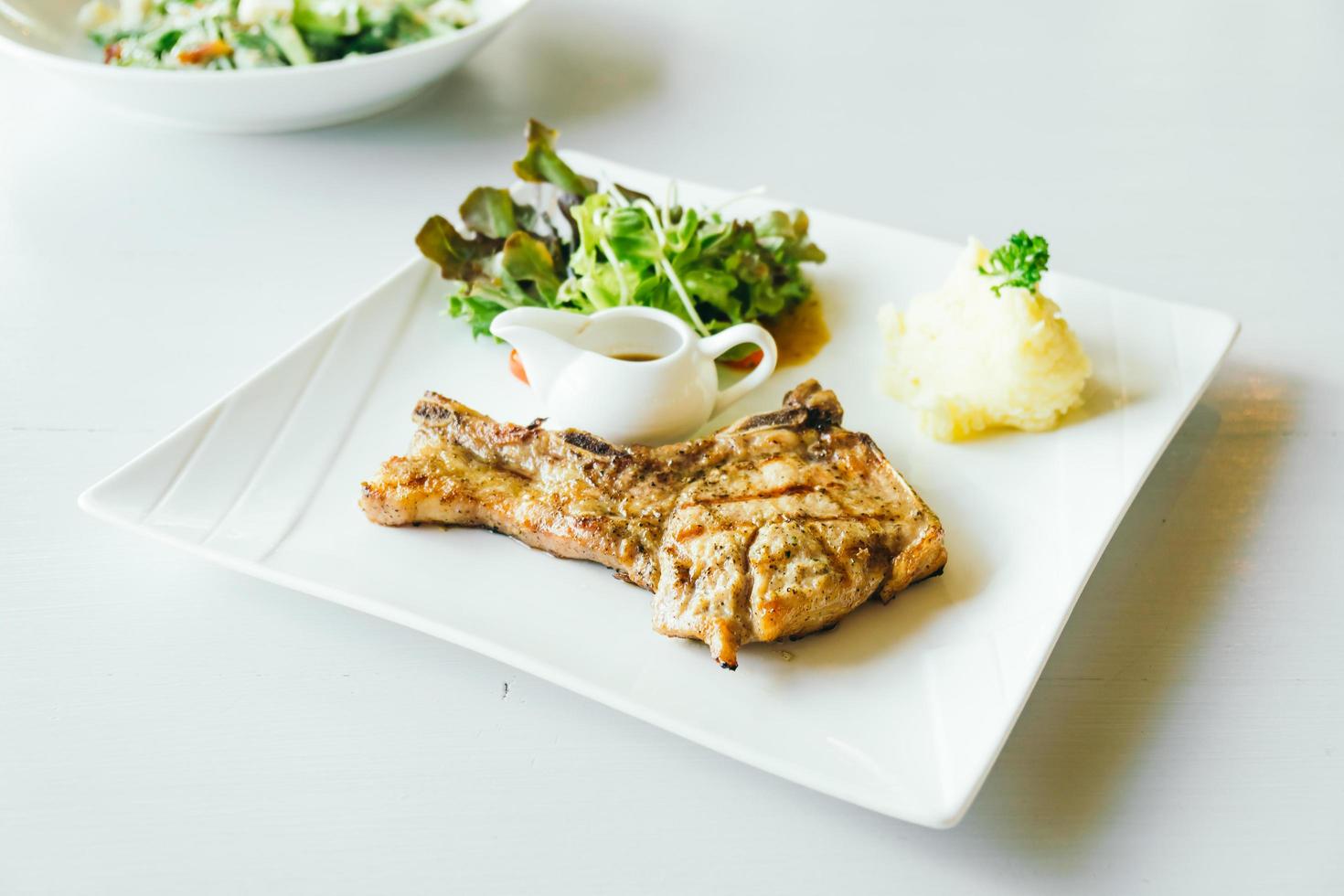 Grilled Pork chop meat steak photo