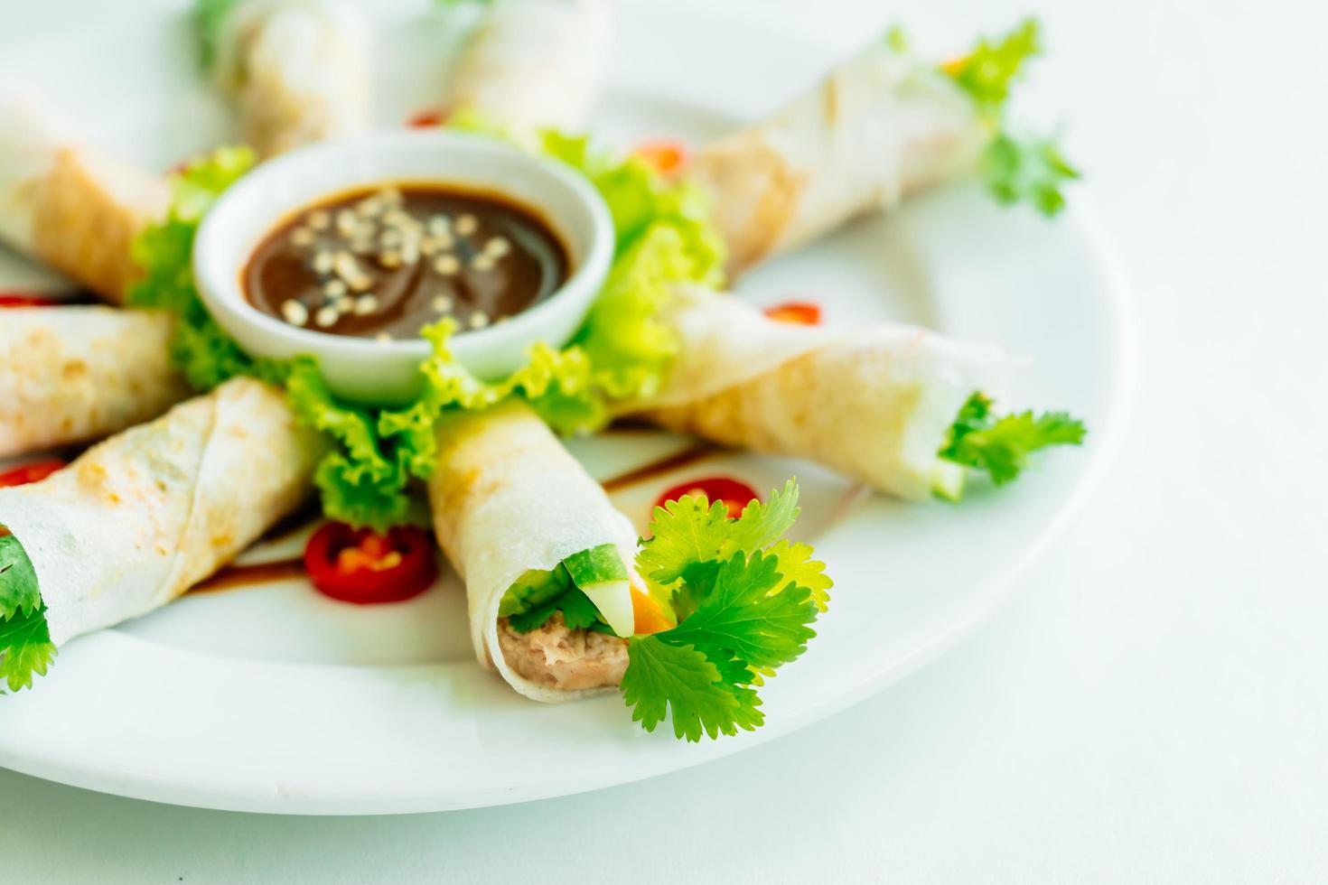 Duck meat inside spring roll photo